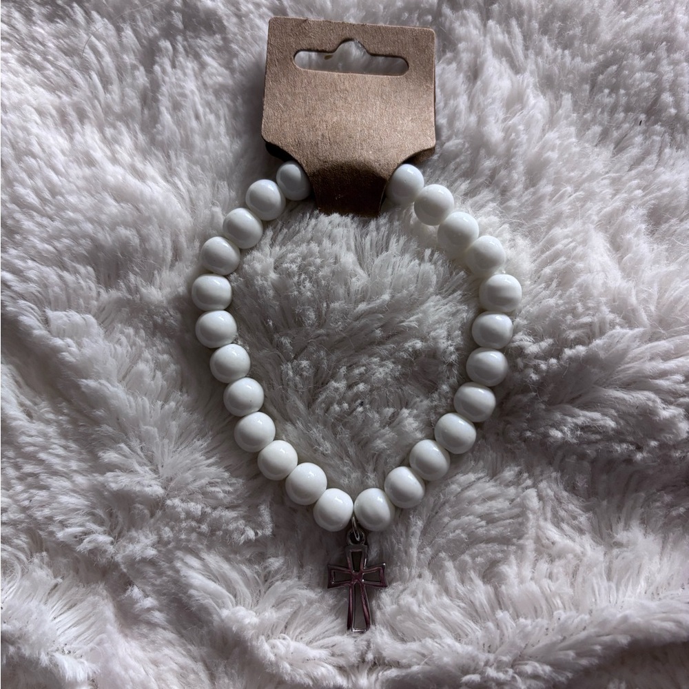 Two glass beaded bracelets; with cross charms. 7.5-8.5inch wrist.